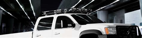 2011 GMC Sierra Roof Racks | Cargo Boxes, Ski Racks, Kayak Carriers