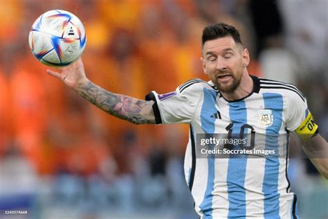 Lionel Messi of Argentina handball during the World Cup match between ...