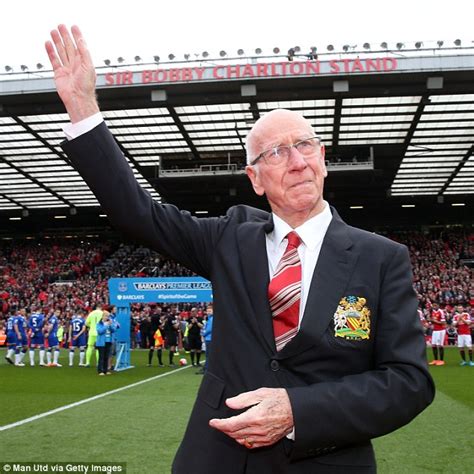 Manchester United and England legend Sir Bobby Charlton moved to tears as Old Trafford stand is ...