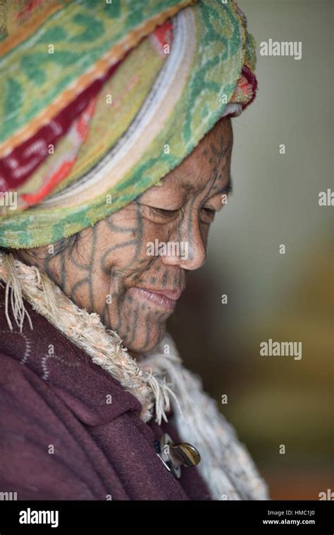 A Muun Chin woman with face tattoos, Mindat, Myanmar. The tribal Chin ...