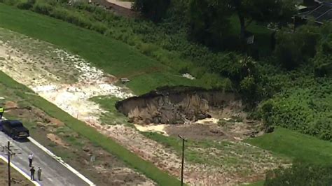 Massive sinkhole opens near Florida homes, closes roads | Fox Weather