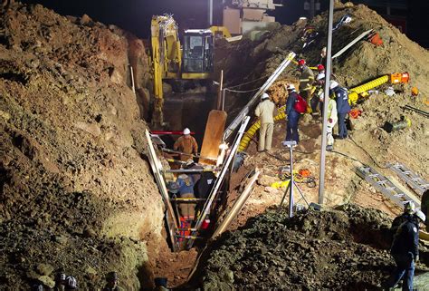 One worker freed from trench collapse in York County; second remains buried, feared dead ...