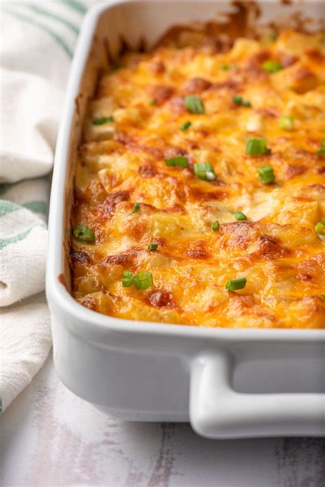 Irresistible Cheesy Potato Casserole is an amazing side dish for weeknight meals or holiday dinn ...