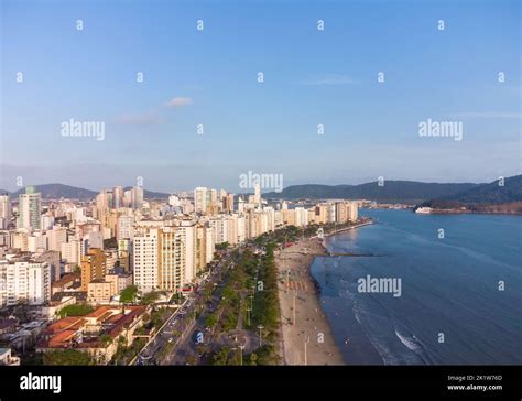 Aerial view of the waterfront to the ocean with its high buildings in ...