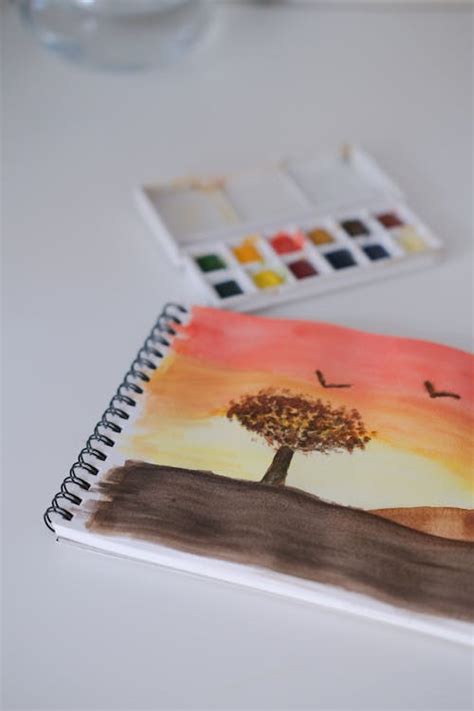 Watercolor Painting of a Tree at Sunset · Free Stock Photo