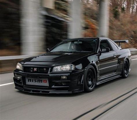 Gorgeous Black Nissan Skyline R34 GT-R running on road - carporn ...