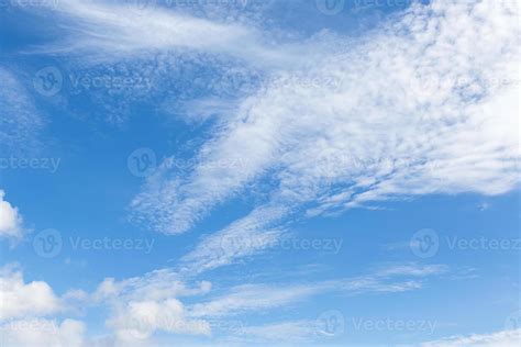 White fluffy clouds in the blue sky 22978745 Stock Photo at Vecteezy