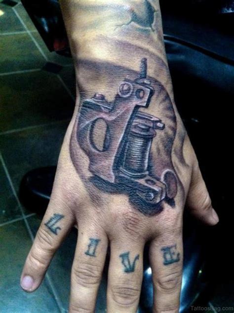 28 Funky Gun Tattoos On Hand