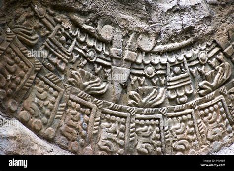 Stone carving with mysterious symbols Stock Photo - Alamy