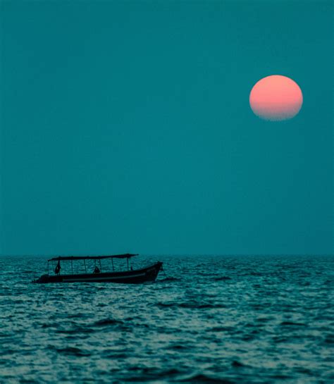 Download Teal Ocean And Pink Moon Wallpaper | Wallpapers.com