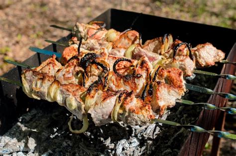 Premium Photo | Pork meat chop cooked on the barbecue grill