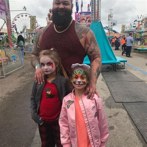 WWE Superstar Bray Wyatt (Windham Rotunda) at a carnival with his daughters Cayden and Kendyl ...