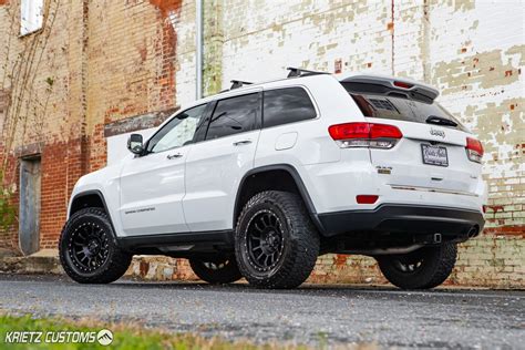 Lifted 2015 Jeep Grand Cherokee with 18×9 Pro Comp 5034 Rockwell Wheels | Krietz Auto