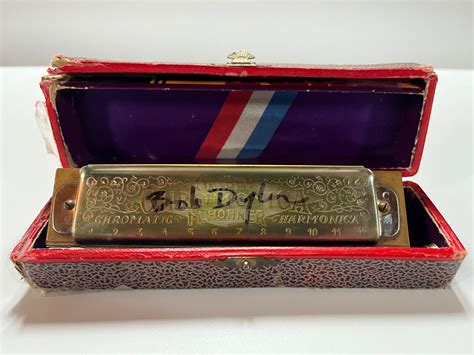 Bob Dylan Signed Harmonica - CharityStars