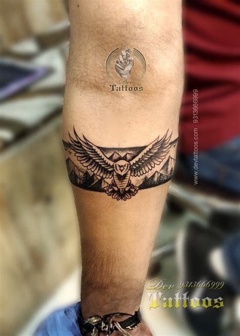 Update 68+ eagle hand band tattoo best - in.cdgdbentre