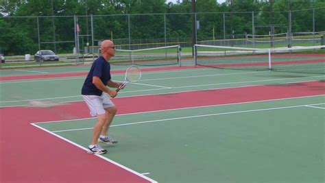 Man Hitting a Volley Shot in Tennis image - Free stock photo - Public Domain photo - CC0 Images