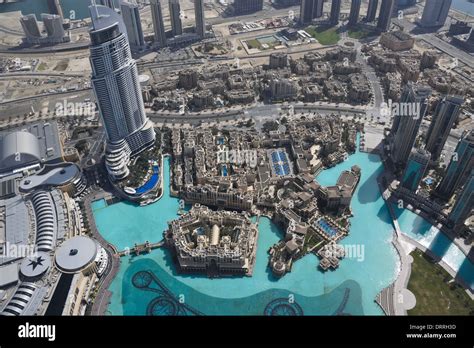 Aerial view of Dubai Mall and Dubai Fountain area, United Arab Emirates, from top of Burj ...