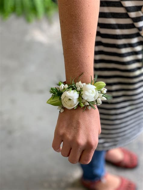 Wrist corsage created with ocally sourceed Spring blooms by Local Color Flowers. www.locoflo.com ...