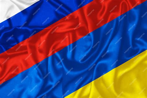 Premium Photo | Combination waving flag of russia and ukraine