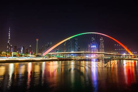 Lighted Bridge over River at Night · Free Stock Photo