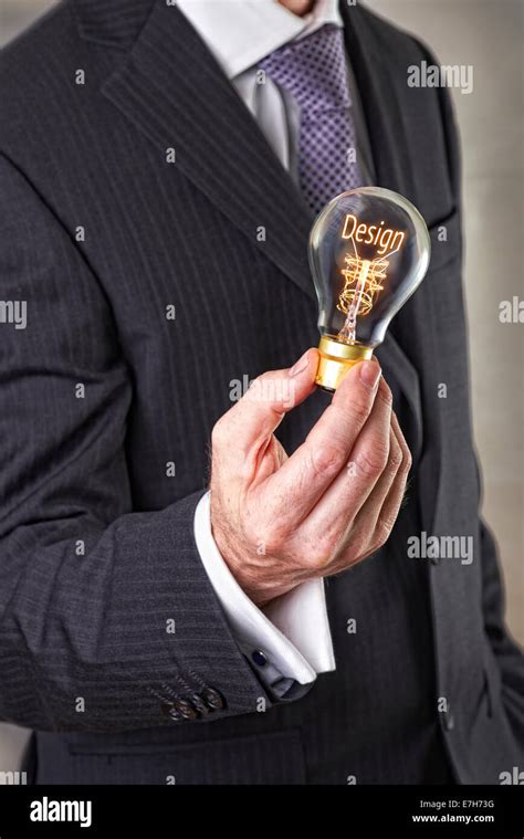 Design concept in a filament lightbulb Stock Photo - Alamy