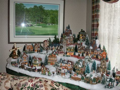 I really like the different heights this person used for their village. | Christmas village ...