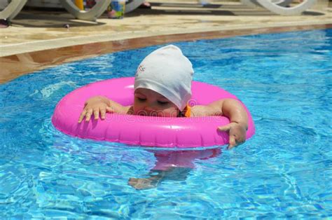 Little Girl Swimming Pool Floatie Stock Photos - Free & Royalty-Free ...