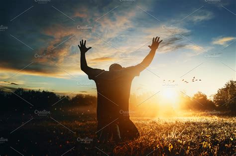 Man raising his hands in worship | High-Quality Holiday Stock Photos ...