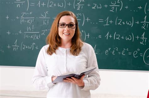 The Female Math Teacher in the Classroom Stock Photo - Image of ...