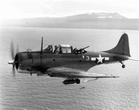 Marine SBD-5 Dauntless white 3 during bombing mission against Japanese targets on Rabaul 22 ...