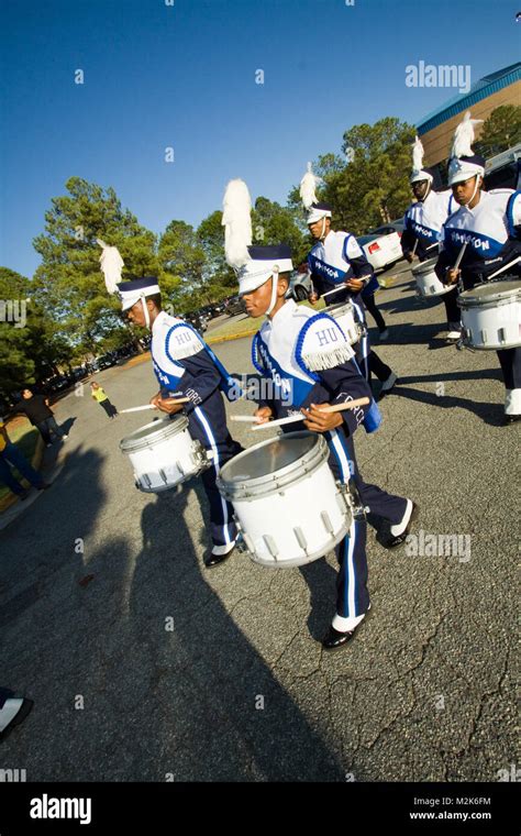 Members of the Hampton University marching band march to Armstrong Stadium for pre-game ...