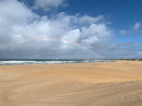 Cape St Francis Beach with rainbow – The Know