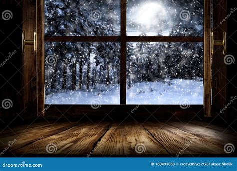 Snowy Winter Night View Outside Window, Table with Blurred Home ...