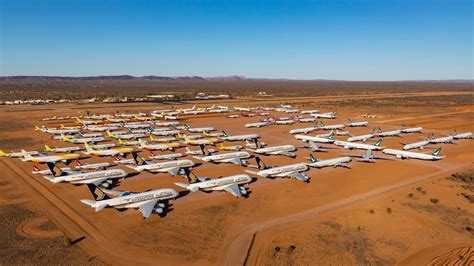 Alice Springs plane ‘graveyard’ packed with aircraft | Photos | The Courier Mail