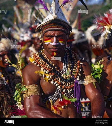 Male tribesman from Papua New Guinea in traditional dress and highly ...