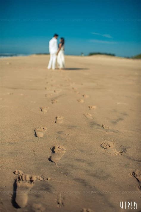 Beach Wedding Couple Portrait with Sand Footprints Couple Picture Poses ...