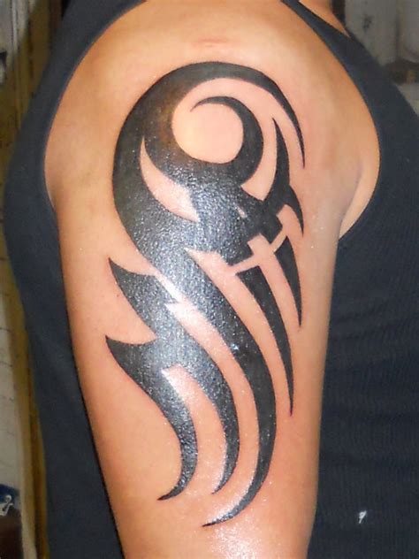 50 Tribal Tattoos For Men - InspirationSeek.com