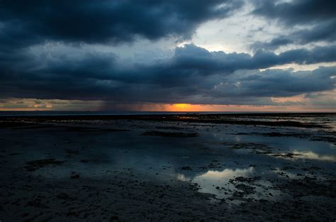 Seashore and water under stormy skies image - Free stock photo - Public Domain photo - CC0 Images