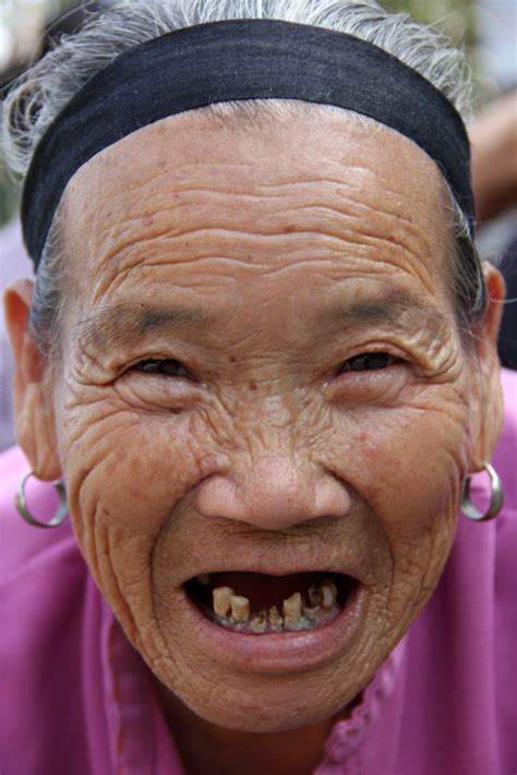 Photo: A Very Smiling (and Toothless) Old Chinese Lady
