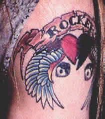 AXL ROSE TATTOOS PHOTOS PICS PICTURES OF HIS TATTOOS