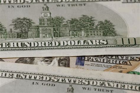 Franklin peeks out of the Zee of old hundred-dollar bills. stock photo in 2023 | Dollar bill ...