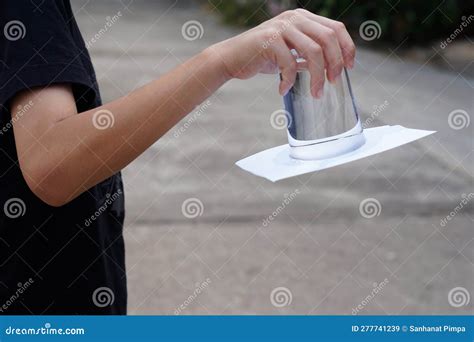 Science Experiment about Air and Liquid Pressure Stock Image - Image of magician, gravity: 277741239