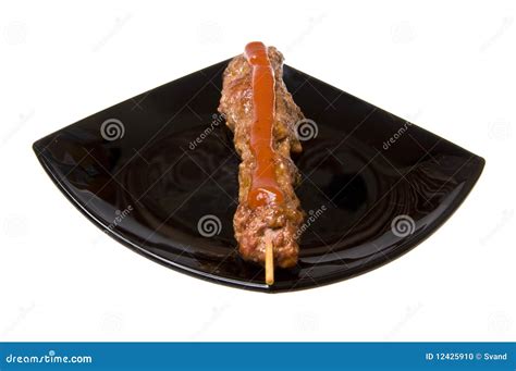 Barbecue on a plate stock photo. Image of meal, grill - 12425910