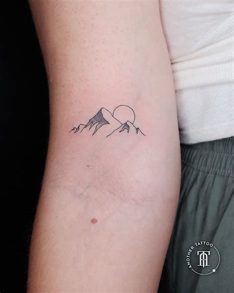 Minimalist mountain tattoo wrist - ploramg