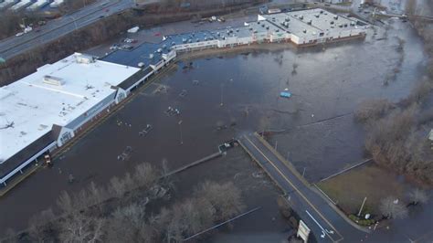 Deadly storm sends water levels skyrocketing on Northeast rivers and at the coast, forcing ...