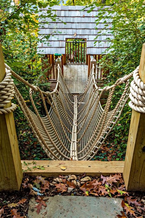 treehouse rope bridge | Cool tree houses, Tree house diy, Tree house designs