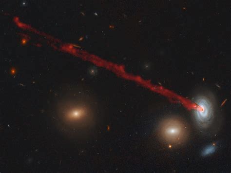 Hubble Spies Doomed Spiral Galaxy Plunging Into the Coma Cluster (and ...