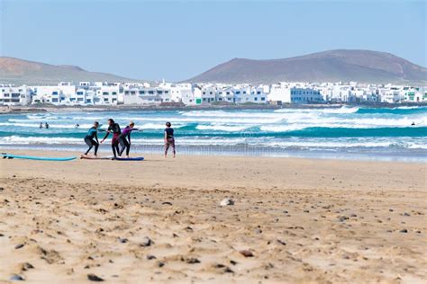 Surfer in Famara Beach in Lanzarote, Canary Islands, Spain. Editorial ...