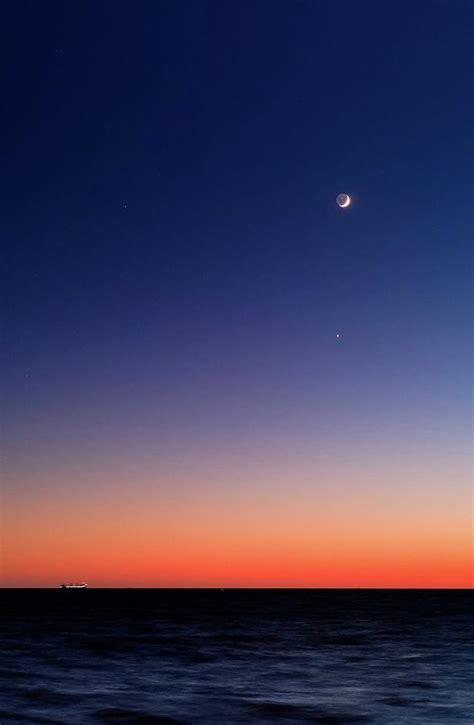 Moon And Venus At Sunrise Photograph by Luis Argerich - Fine Art America