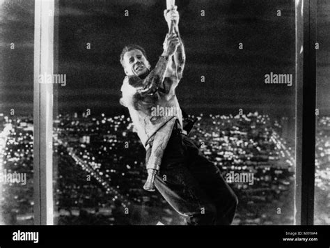 Bruce willis die hard 1988 Black and White Stock Photos & Images - Alamy